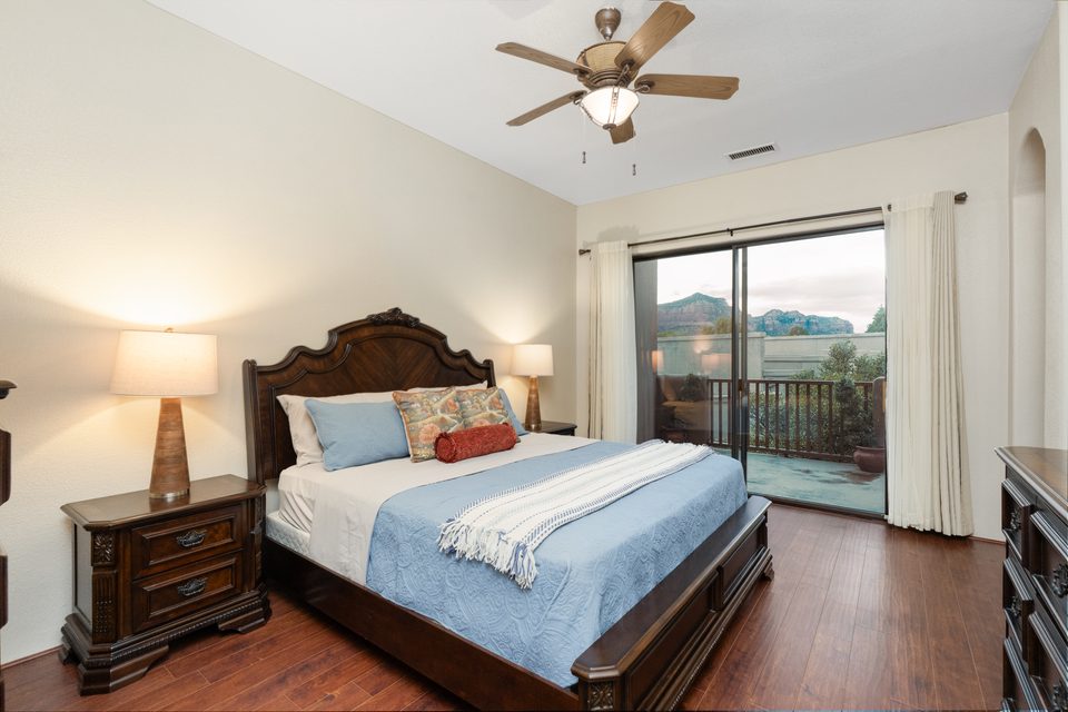 An ensuite bedroom opening to the balcony