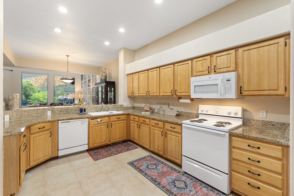 An open kitchen and breakfast nook