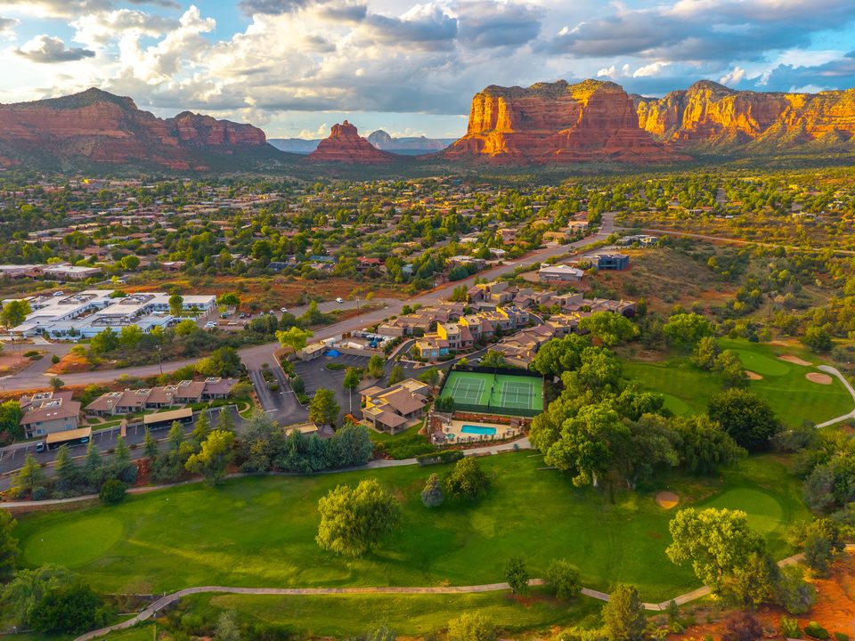 Golf greens and the wider landscape · Aerial photograph