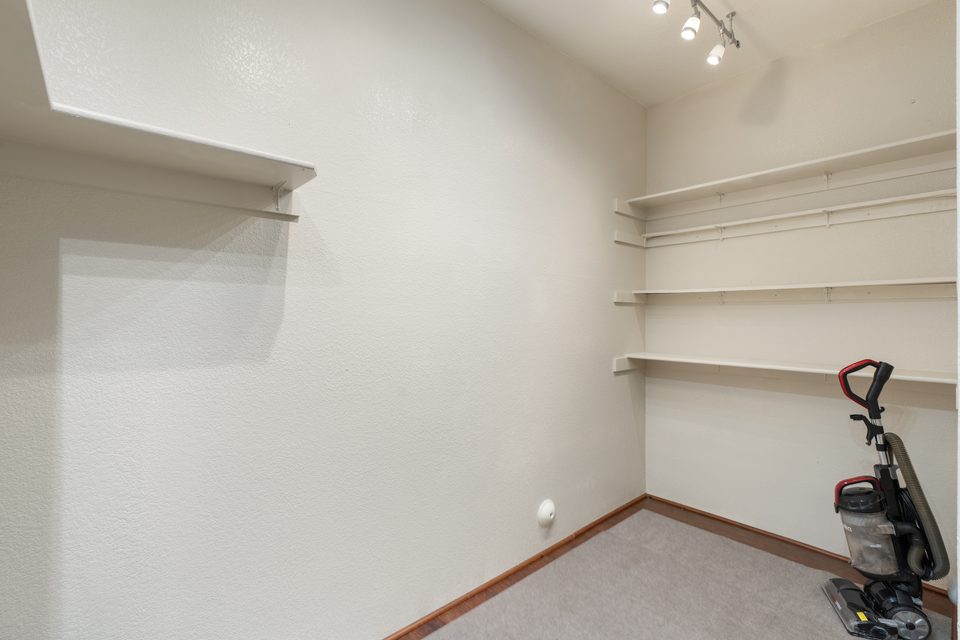 A walk-in closet off the ensuite bath