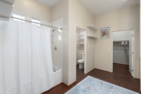 The bathtub and adjoining dressing area