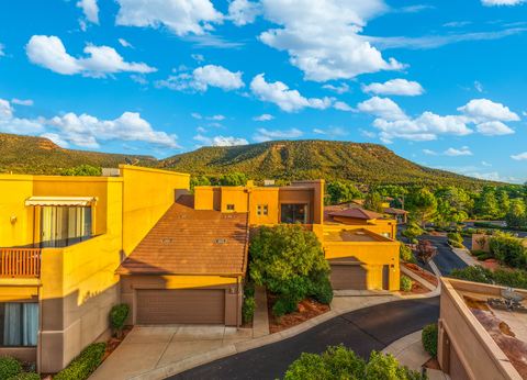 The front of the home in warm evening light · Aerial photograph