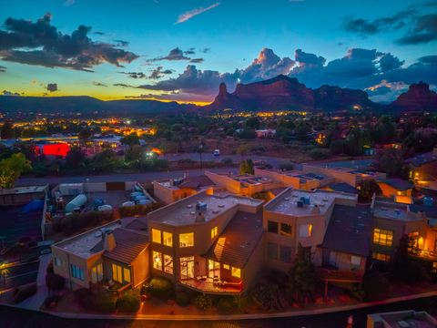 Twilight over the home and red rocks · Aerial photograph