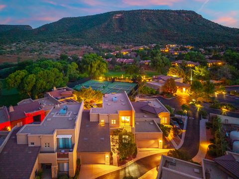 The front entrance at dusk · Aerial photograph
