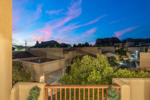 The balcony beneath a pink evening sky